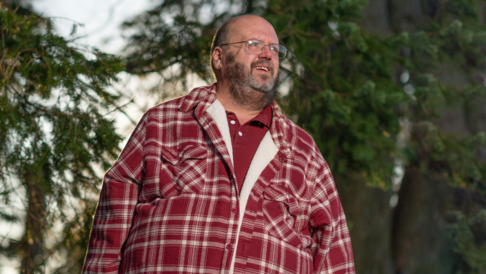 Man in red flannel shirt with beard